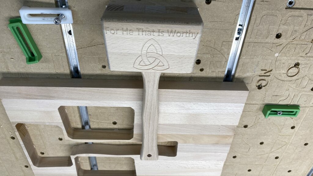 the engraving reads "for he that is worthy"