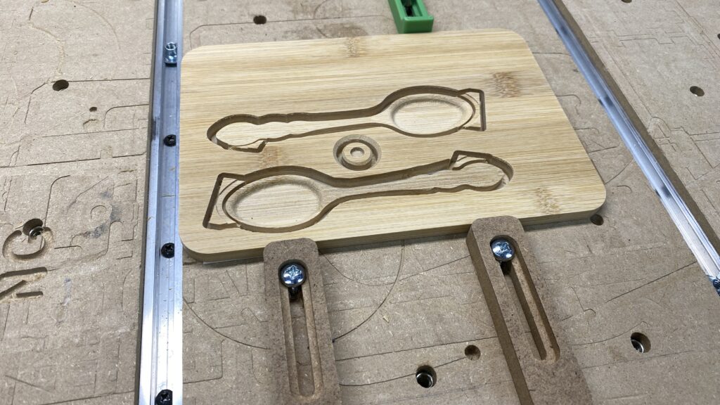 The spoon upright is made from two halves. The magnet holder is also cut in this operation.