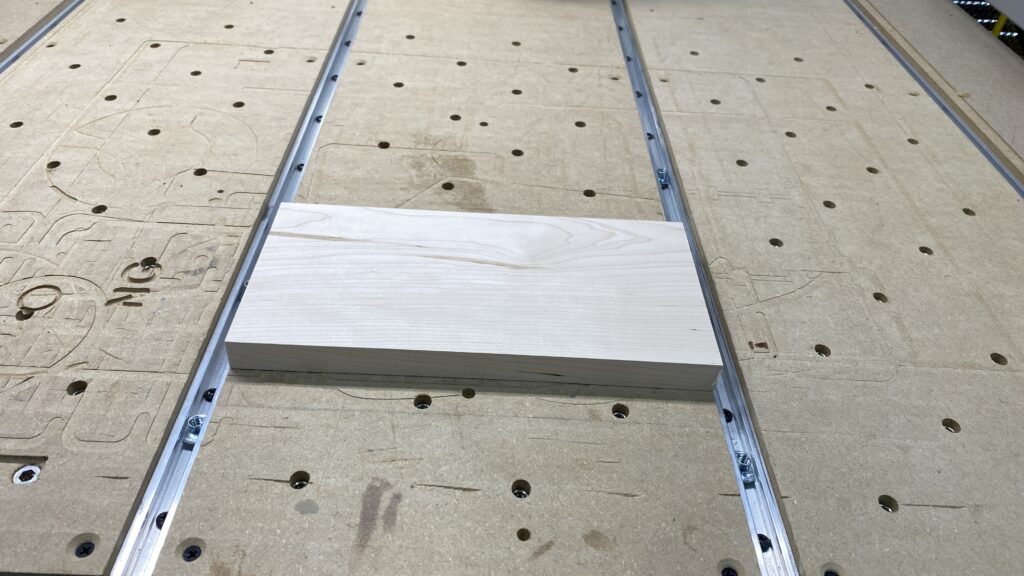 maple board mounted on CNC waste board