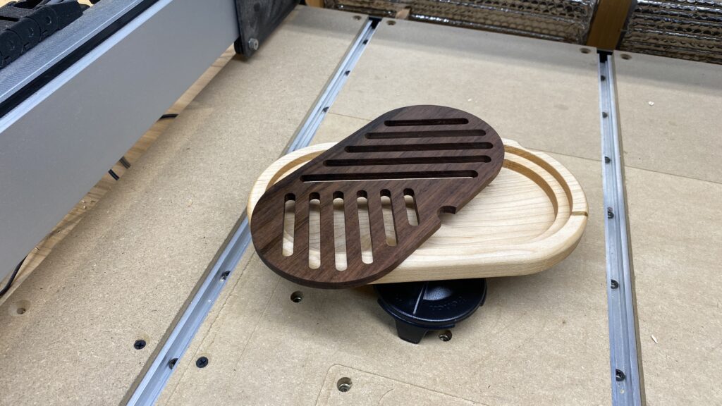 Bread crumb tray with walnut insert removed.