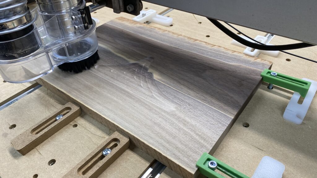 Walnut board mounted firmly to waste board.